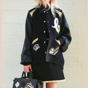 Coach 1941 varsity bomber with gold inserts and leather sleeves